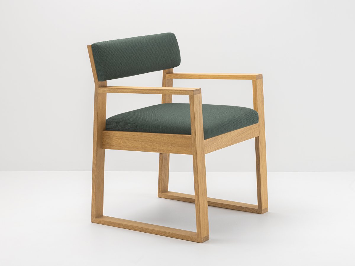 Fauteuil design en tissu vert