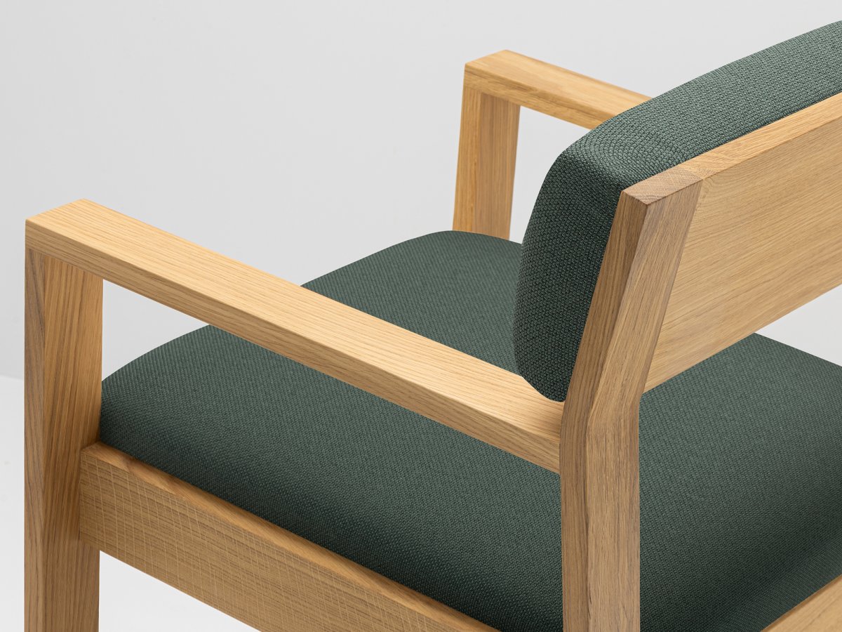 Fauteuil design en tissu vert