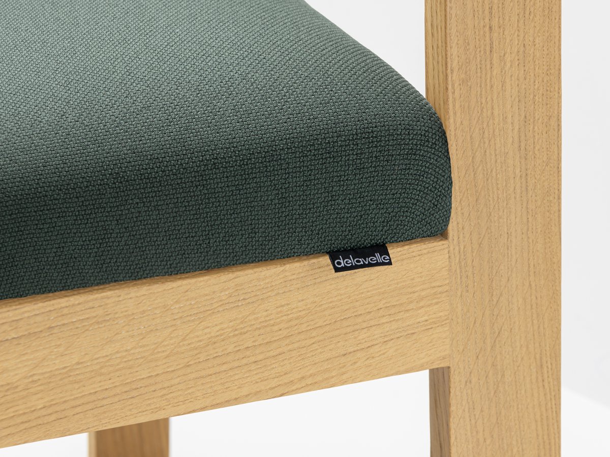Fauteuil design en tissu vert